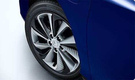 Wheels and Tires To further enhance efficiency, the tires are 235/45 R18 Michelin Energy Saver all season units designed to minimize rolling resistance while retaining fun to drive handling dynamics.