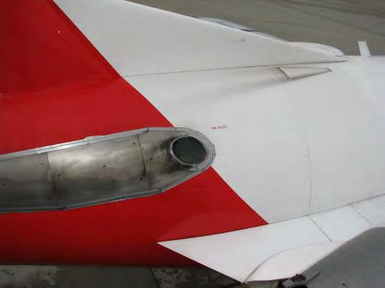 Image 3: Airplane tail section with APU air