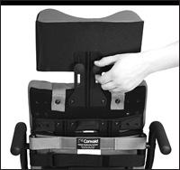 The vest is attached to the chair with straps that wrap around the seat back and connect with Velcro, and shoulder straps that screw into the solid seat back. Adjust side straps for proper fit. Fig.