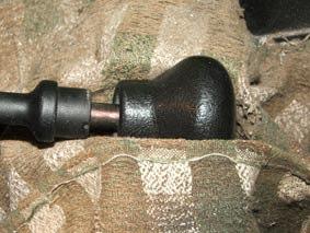 Fix the gearknob in a clamp, held in a cloth, as shown in this picture.
