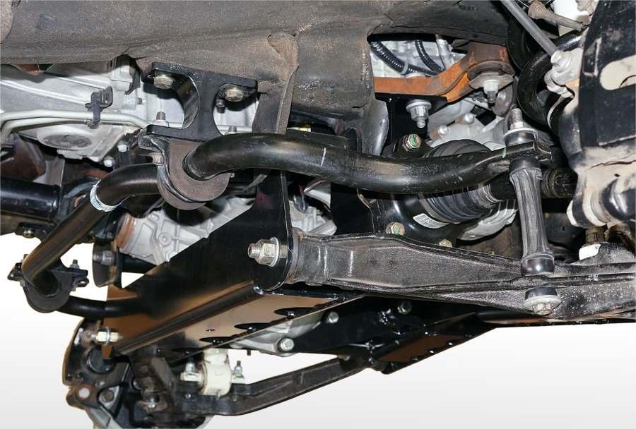 3) Install driver side brake line drop bracket RS176915 to upper control arm pocket using OE and supplied ¼ hardware from kit RS860738. See Illustration 30.