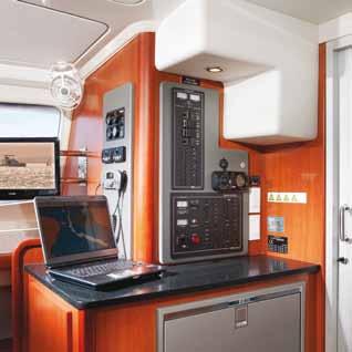 Fully equipped with a standard stainless steel stove with oven and broiler, a deep sink with mixer tap and ample counter and cabinet space, this galley is