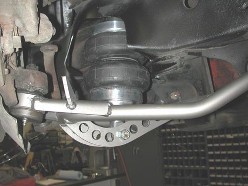 Installation Instructions 1. After removing the factory lower control arm, clean the bushing mounting surfaces on the frame and lubricate with Lithium grease. 2.