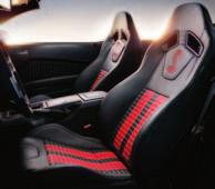 5" tips 7 3 Leather-trimmed front sport seats with racing stripes and Alcantara trim Heated front seats Base Shaker Audio System