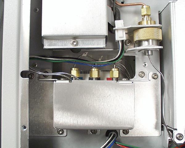 Remove the Existing Detector and Flow Manifold 1. On the top of the lid, loosen the connector cover plate screws and remove the plates.
