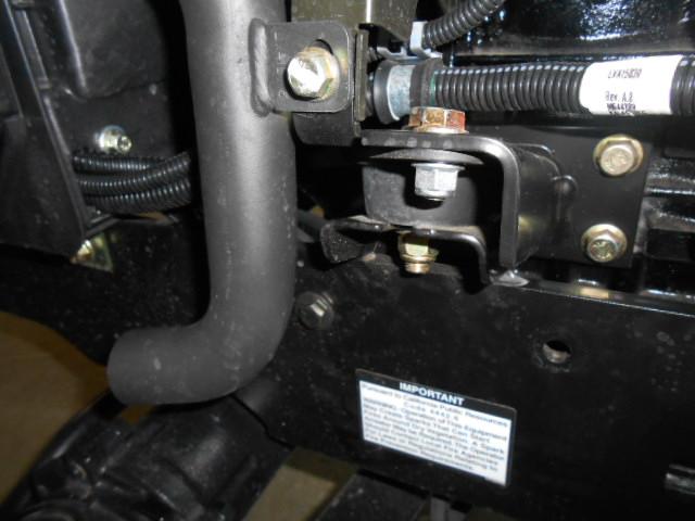 Connect negative lead with the black wire from the main relay and breaker harness, to the -12VDC terminal of battery (Figure 17). 46. Turn ignition key on and start tractor. 47.