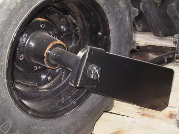 The rear (straight) leg is mounted over the 4 x 4 front to rear frame brace member. This is the third front to rear brace from the end. Assemble casters to look like the picture below.