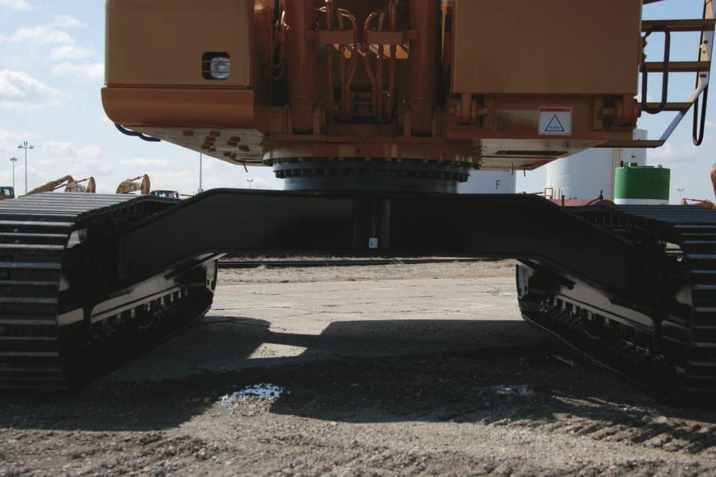 Longer track roller frames increase over-the-front stability. Stands up in the toughest applications. Modified X-shaped, box section carbody provides excellent resistance to torsional bending.
