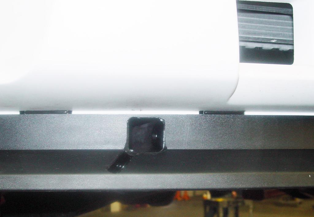 Now, place a ½" x 4½" bolt through the rearmost hole of the rear support brace, frame rail and main receiver brace. Finish with a ½" lock washer and nut (Fig.N). Fig.