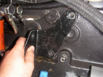 7) loosely and align so compressor bracket is flush with the engine bracket previously