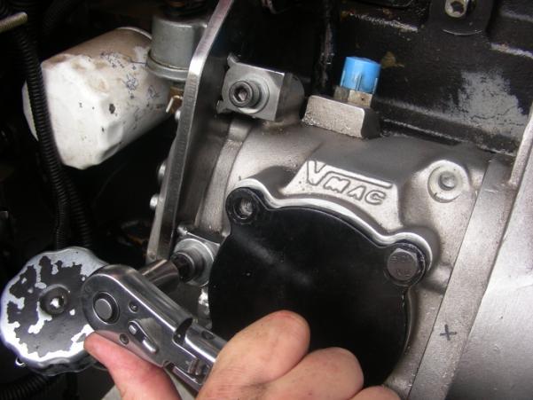 5.11 Tighten engine bracket fasteners, rear compressor bracket fasteners, and 3 bracket fasteners in that order. (Figure 5.10). Figure 5.10 Securing the compressor bracket 5.