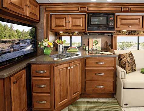 Choose from three cabinet finishes, English Chestnut, Medium Alderwood, and Ivory Cream, and three fabric schemes, Fossil,
