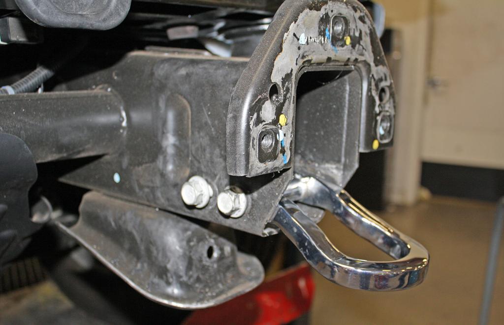 Fig.M Fig.N 10. On the driver's side only, remove three 15mm (head) bolts attaching the bumper mounting plate to the frame rail (Fig.M). 11.