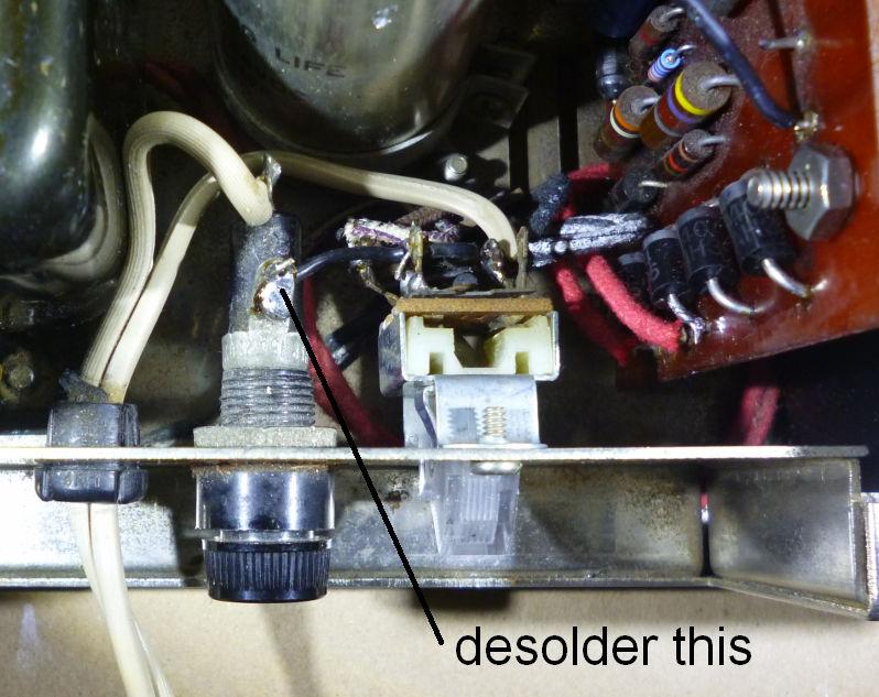 Figure 13. Desolder it from the fuse side. This should give you enough freedom to carefully wiggle the switch out of the amplifier.