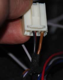 Step 28: Route the Traction Control Harness through the