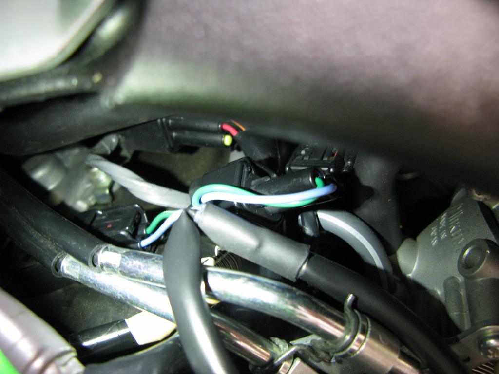 10. Now connect the main of the Bazzaz COIL HARNESS to the control unit and begin to route the harness down the left side of the motorcycle and to the top of the engine.