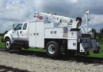 - Rail Rack w/tie Downs - Rear Mud Flaps - Painted to Match Chassis Crane - 29,500 Ft/Lbs - Proportional Radio Remote Control - Hydraulic/Manual Reach to 21 - Planetary Winch - Double Acting