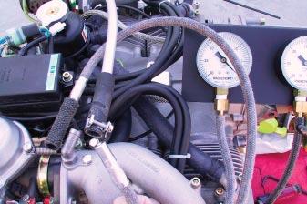 Start the engine and adjust the throttle to produce about 2000 rpm.