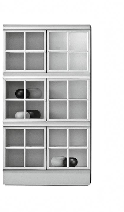 PIROSCAFO aldo rossi, luca meda single units AND ACCESSORies A series of bookcases either open or with glass doors, with square metal frame, divided in four by an