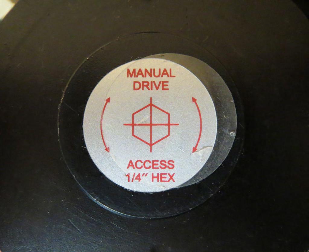 A standard hand-held drill is all that is required. 1. Remove protective label (Fig. 19). 2. Insert hex bit into coupler found under protective label (Fig.