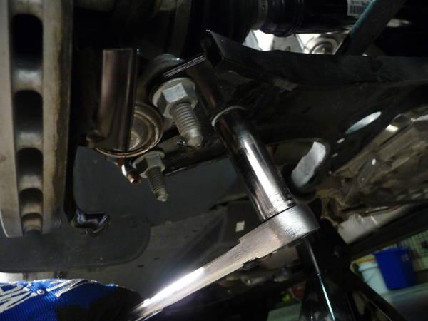 Have a friend hold the brake while you install a new drive axle bolt.