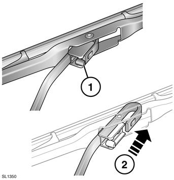 Note: Where a spare wheel is mounted on the taildoor, the wheel must be removed before replacing the wiper blade. Insert a needle into the jet and gently adjust.