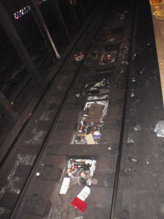 (See Appendix II, page 3 for pictures of debris found before and after this station was cleaned by the vacuum train.