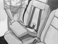 Fold the child restraint cushion and leg rest up into the seatback. 3.