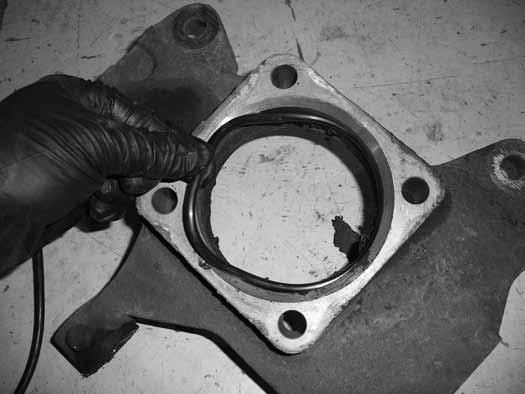 Figure 31 Figure 32 54. Install the factory hub o-ring into the new knuckle hub bore.
