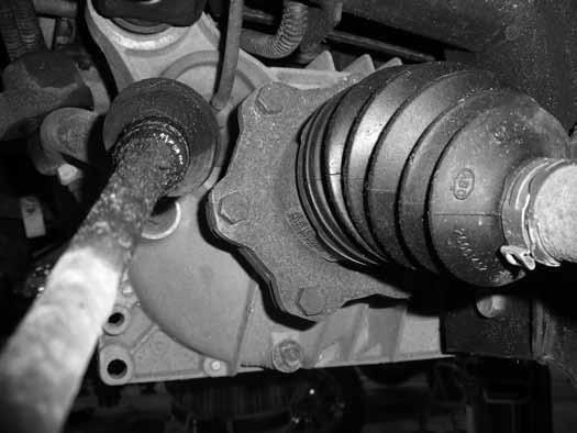 Remove the CV axle nut and washer. Save hardware. Figure 8 18. Remove the CV axle flange bolts at the differential Figure 9. There are 6 bolts per side. Discard the bolts. Figure 9 19.