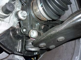 3. Separate the lower ball joint from the spindle by removing the bolt.