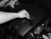 Figure 4 Pull the engine cover out from the