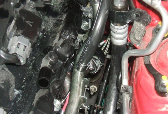 Plug in the connector for the rear throttle body. 9. You will now install the throttle body extension harness. It measures approximately 17 in length.