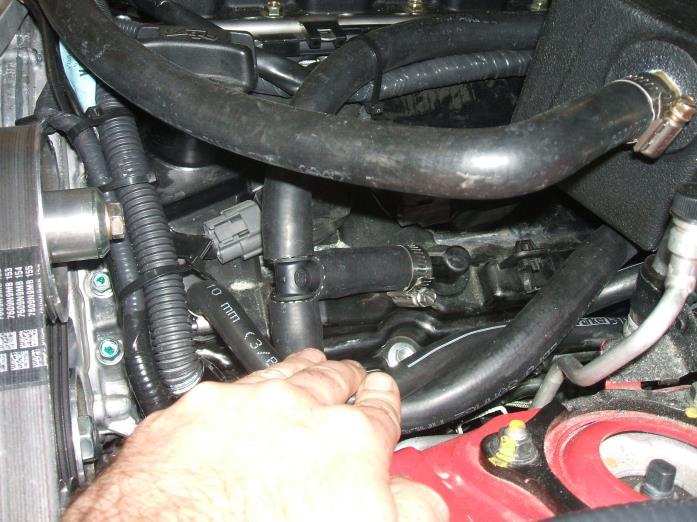 hose and clamps, route these lines from the PCV valves to the 90º fittings in the back of the manifold. (photo 60) 6.