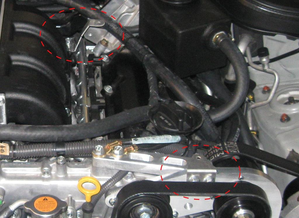 which are holding on the support brace. See (Fig.2) You will be reusing the existing bolts already in place.
