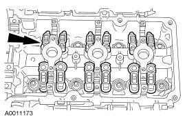 RH shown, LH similar. 7. Install the LH and RH camshaft roller followers. Fig. 285: Locating Camshaft Roller Followers 8. Apply clean engine oil to the LH and RH camshafts. 9.
