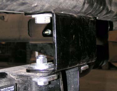 a. O.E. Trailer Hitch: Install kit bracket (bumper, rear, middle) onto O.E. trailer hitch, if equipped, with two kit bolts (7/16 x 1-1/2 ), four kit washers (7/16 USS), four kit washers (1/2 x 3/16 x 1-3/4 ), and two kit nuts (7/16 Nylock).