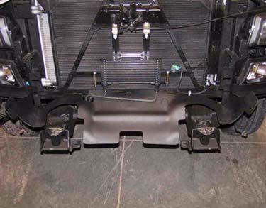 Install transmission cooler to core support bracket with two kit spacers (2 x.5 ID x.