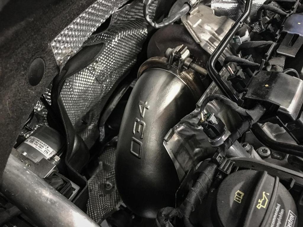 Install the 034Motorsport Cast Downpipe onto the
