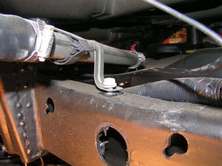 Clips Fuel Filler Cap Rear Bumper c. 2005 model: Remove bolt and fuel filler from frame.