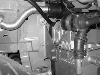 Install bracket on heater again. Tighten Ejot screws to 0 Nm.