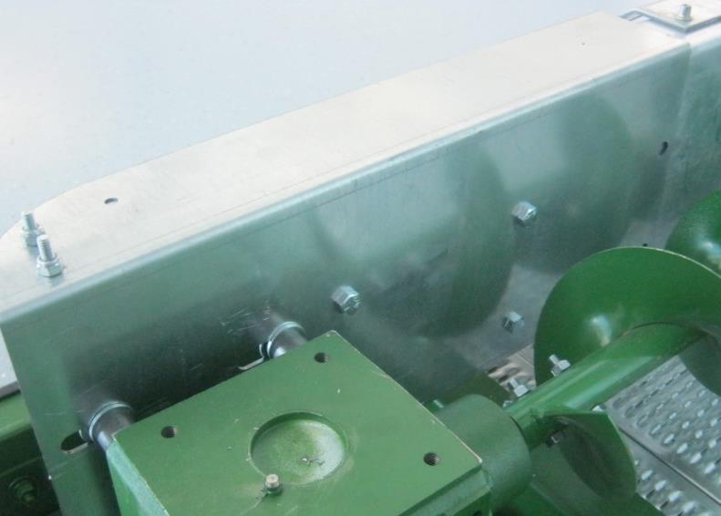 Bring sweep auger and backboard into bin. Bolt sweep auger to gearbox output shaft. See Image 1. ASSEMBLING BIN SWEEP & SWEEP STOP Place spacers on stud bolts in gearbox as shown in Fig.