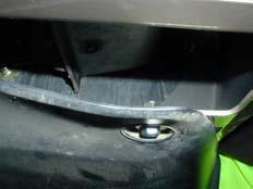 Trim top of mudflap level with top of buffer along dashed line