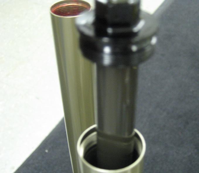 4) If you are replacing the tube or the damper, pull the cartridge tube off the damper end cap.