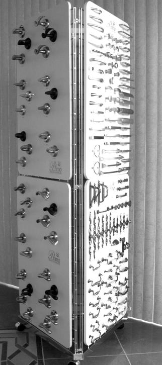 FREE-STANDING DISPLAY DOOR & CABINET HARDWARE 15 2008 Showroom Displays All Door and two Cabinet Hardware Display Boards on a triangular, free-standing grid display on wheels.