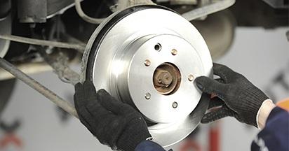 1. Extract the adjuster hole plug; 2. Align the hole with the adjuster ratchet wheel by turning the brake rotor. 3.