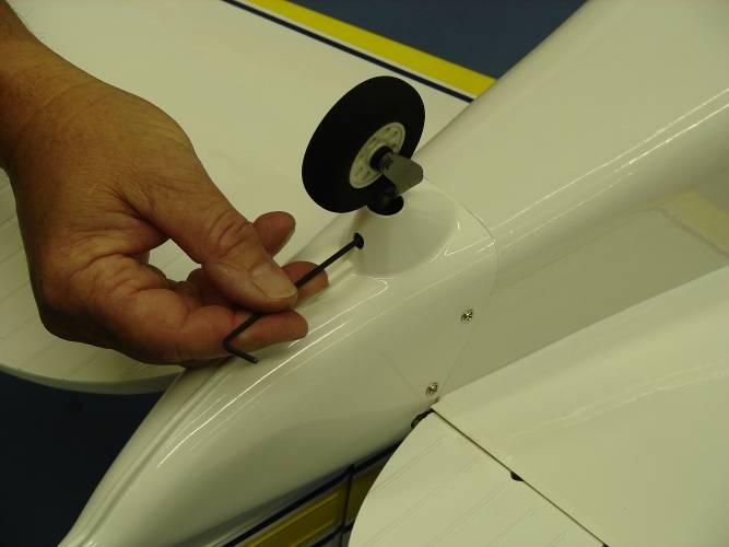 26. Install the tail wheel onto the tail wheel mounting shaft and tighten set screw as shown