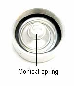 3. Insert the conical spring into the machined groove in the air cylinder cap followed by the square cut gasket.