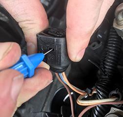 3. Using a small flat blade screw driver remove the terminal lock