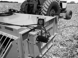 Stopping the Tractor Before dismounting power unit or performing any service or maintenance, follow these steps: disen gage power to equipment, lower the 3-point hitch and all raised components to